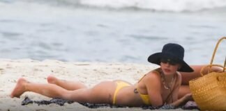 Isis Valverde curte dia de sol na praia da Barra da Tijuca