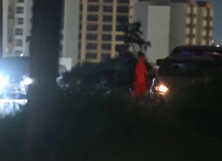Vídeo: P3ladona do sobretudo desafia PM na fila do “bumbum guloso” no DF Reprodução/ Vídeo / Kebec Nogueira / Metrópoles