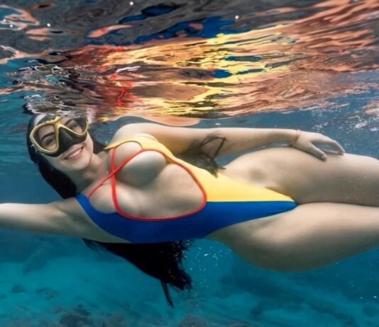 Já pensou em mergulhar e dar de cara com a pequena sereia de verdade?