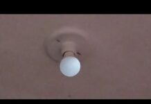 Por que a lâmpada LED fica meio acesa com o interruptor desligado