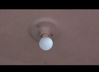 Por que a lâmpada LED fica meio acesa com o interruptor desligado